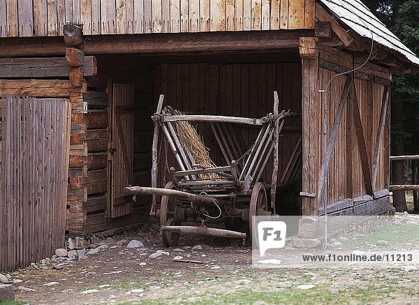 Farm wagon in wooden barn  Slovakia
