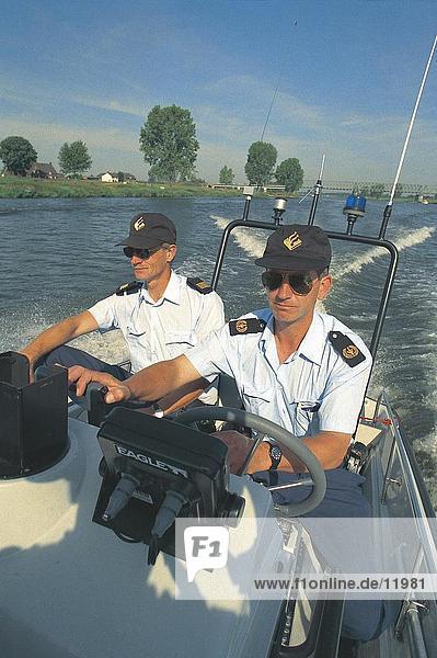 Policemen on police launch  Netherlands