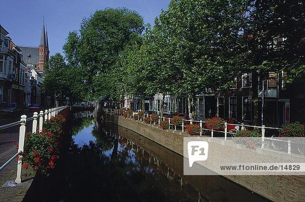 Buildings along canal  Gouda  Netherlands