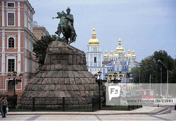 Horse rider statue in city with cathedral in the background  St Michaela  Rider monument  Kiev  Ukraine