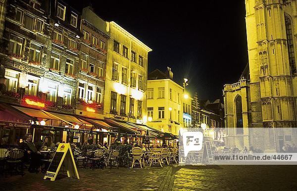 Tourists sitting at outdoor restaurant  Antwerp  Belgium