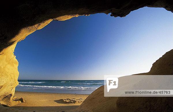 Sea viewed from natural arch  Fontanilla Beach  Conil de la Frontera  Costa de la Luz  Andalusia  Spain