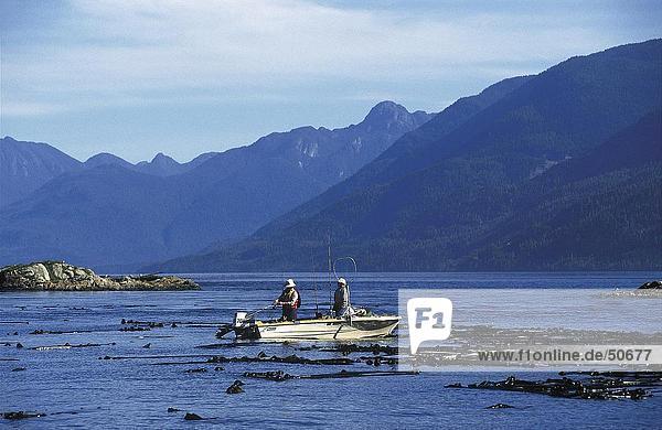 Fishermen fishing in sea  Broken Group Islands  Vancouver Island  British Columbia  Canada