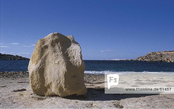 Rock on beach  Gnejna Bay  Malta