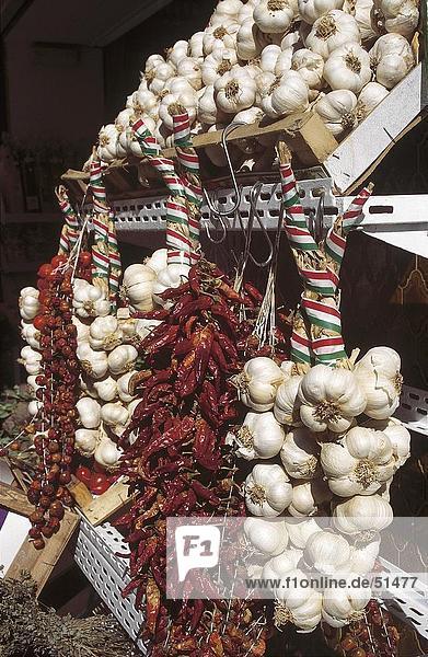 Close-up of strings of garlic and chillis  Naples  Italy  Europe