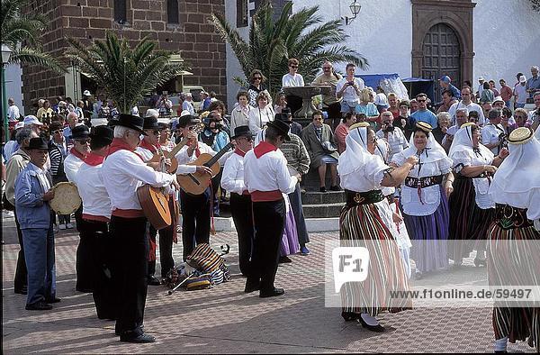 People looking at folk dancers performance  Teguise  Lanzarote  Canary Islands  Spain
