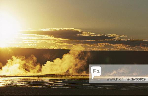 Steam emitting from lake at dusk  Yellowstone Lake  Yellowstone National Park  Wyoming  USA