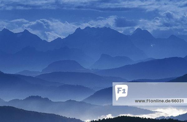 Fog over mountain range  Kampenwand  Chiemgau  Bavaria  Germany