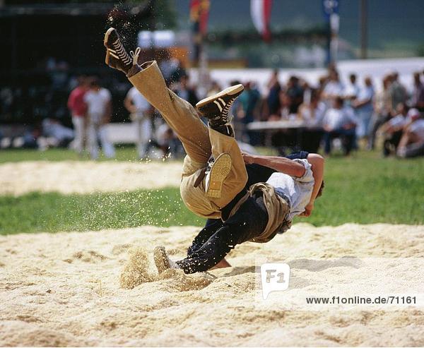 10015983  action  fight scene  Rigi  Swiss wrestling  swings  Switzerland  Europe  tradition  folklore  sport