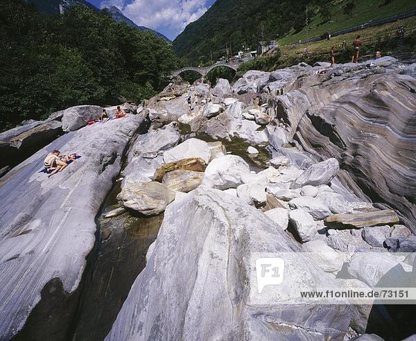 10467765  bridge  rock  cliff  river  flow  Lavertezzo  people  Switzerland  Europe  sun themselves  Ticino  valley of Verzasc