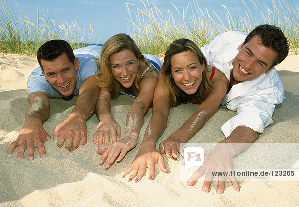 Two couples on the beach