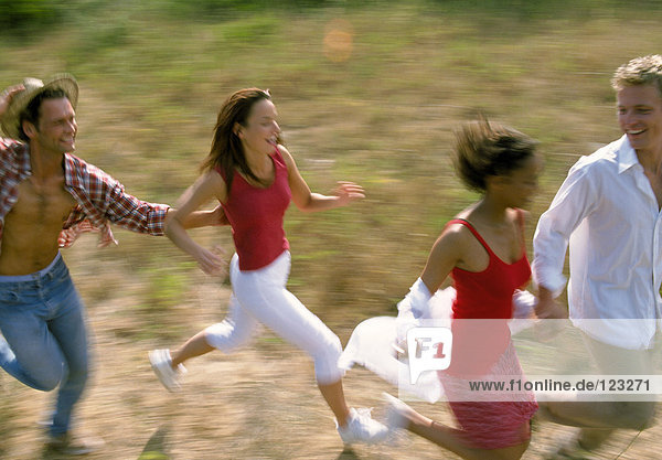 Two couples running