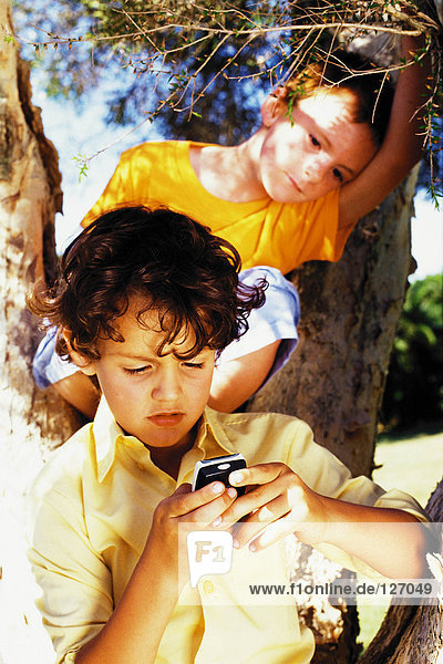 Boys with a mobile phone