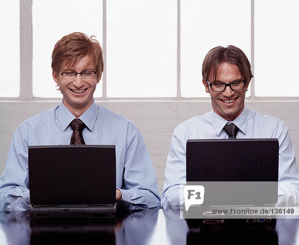 Two businessmen working