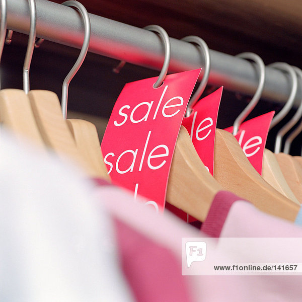 Sale labels on clothes hangers
