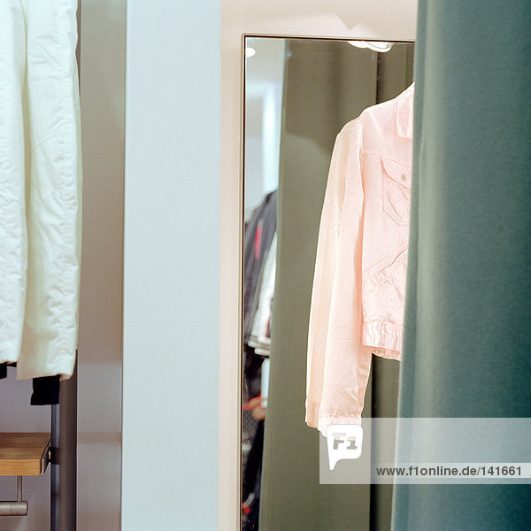 Pink jacket in fitting room