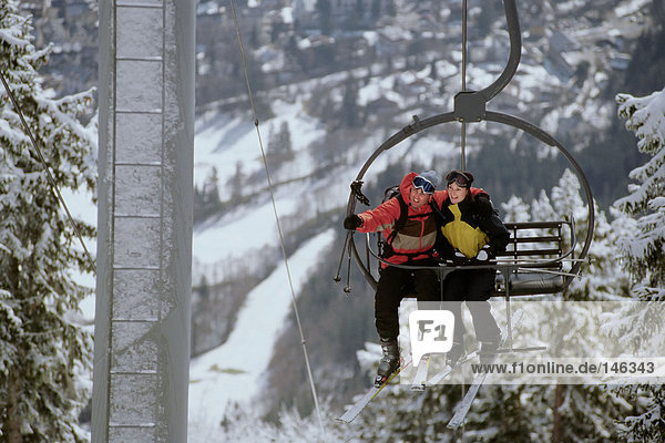 Couple on a ski lift