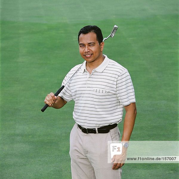 Portrait eines männlichen Golfers