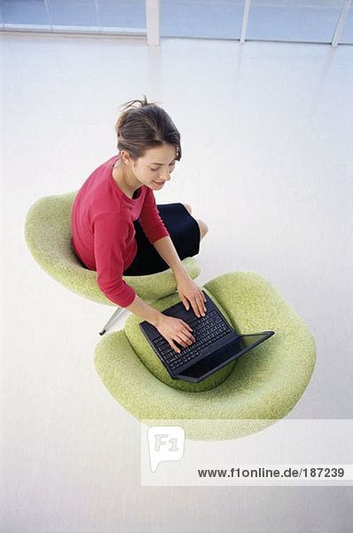 Office worker using laptop