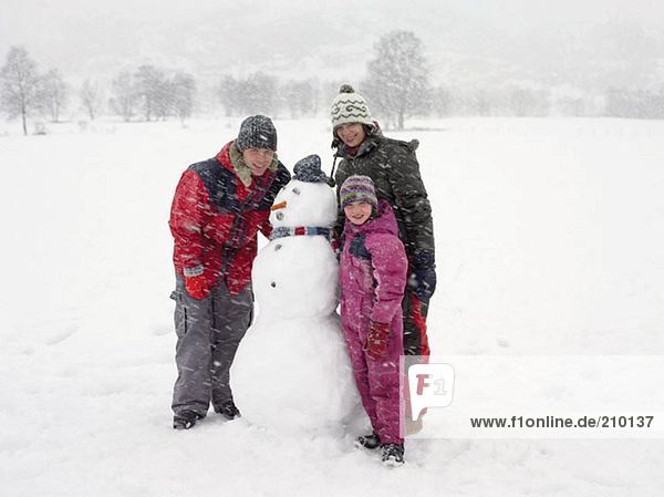 Family with snowman