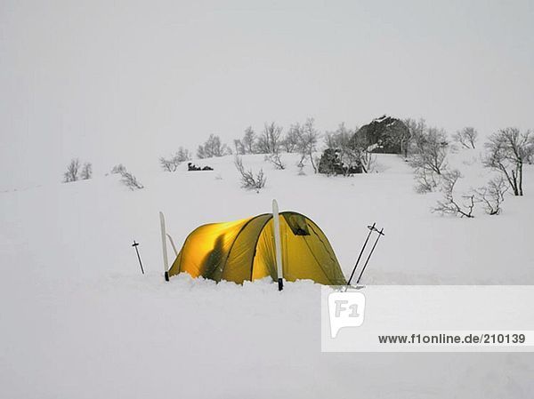 Skiers in a tent