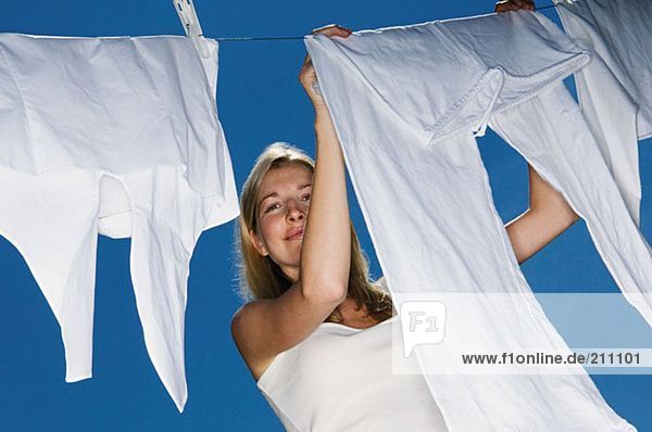 Woman hanging out washing