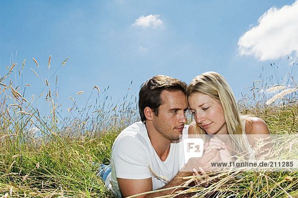 Loving couple in a field