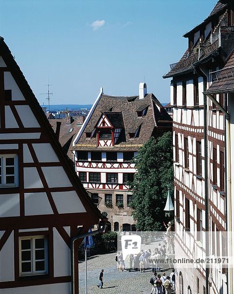 High angle view of tourists near timber framed house  Albrecht Duerer House Museum  Nueremberg  Germany