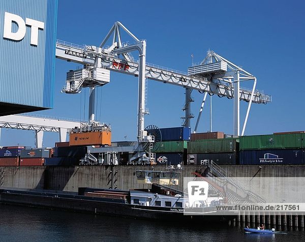 Cargo containers and crane at harbor  Ruhrort  Duisburg  North Rhine-Westphalia  Germany