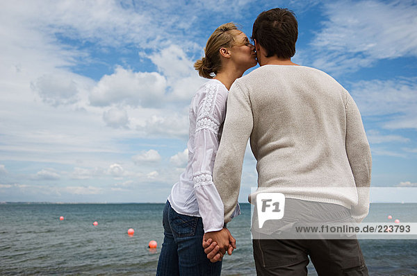 Romantic couple by the sea