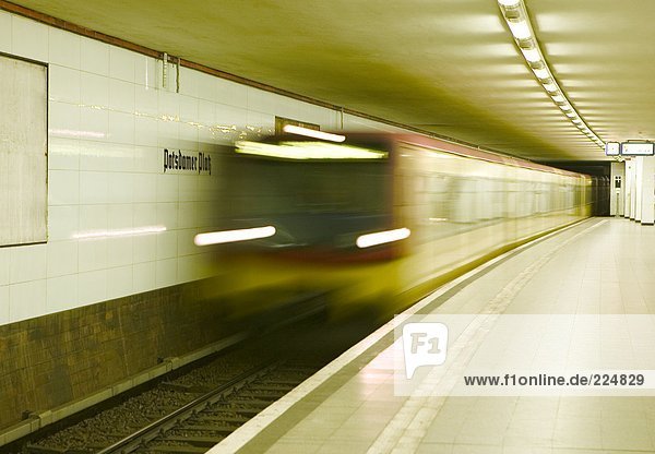 Blurred view of train leaving platform