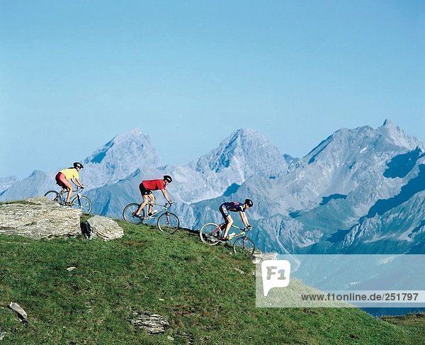 10419490  bicycle  riding a bicycle  biking  riding a bike  bicycle  bike  biking  mountains  alpine  Alps  action  mountain p