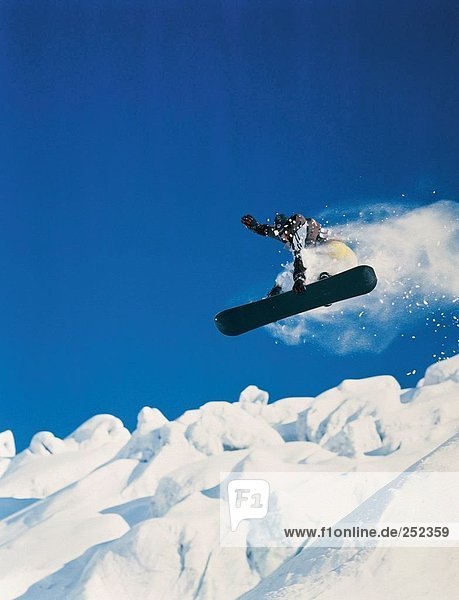 10214479 Bernina area snow cloud snowboard driver jump from below winter sports sport Snowboarding snowboardinging