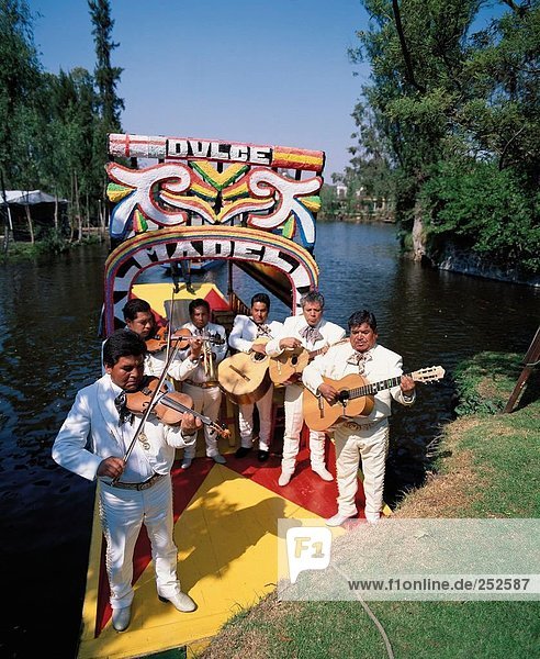 10501303  Mariachis  Mexico  Mexico city  musician  Trajinera raft  UNESCO  folk music  Xochimilco  group