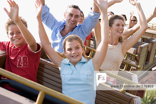 Family riding on rollercoaster