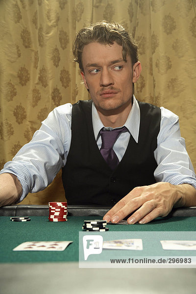 A man playing poker.