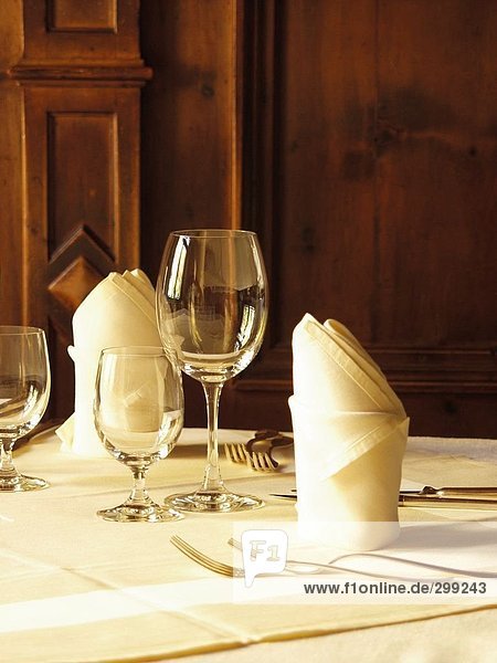 Place setting with folded cloth napkins
