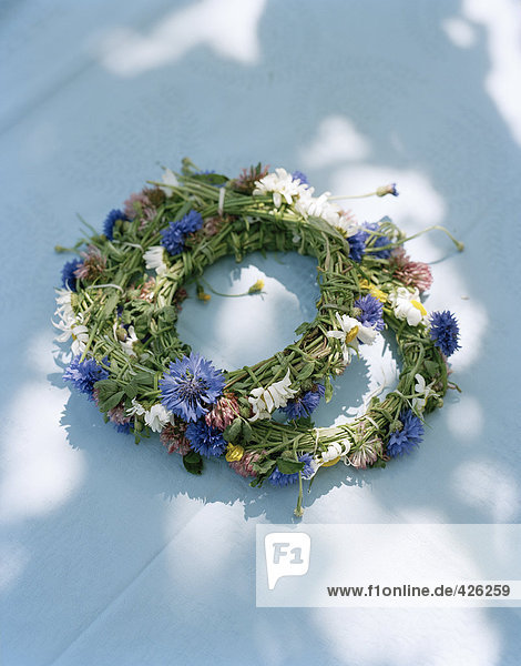 Midsummer wreaths on a table.