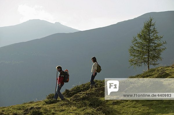 Young couple walking in mountains