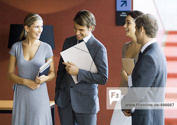 Businesspeople standing  talking