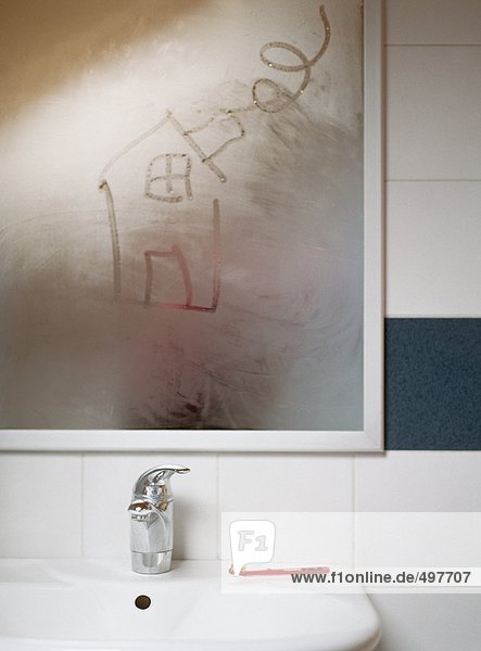 House drawn in condensation on bathroom mirror