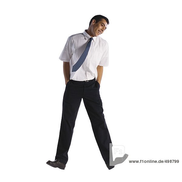 Man jumping with hands in pockets
