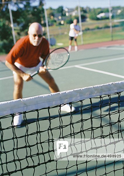 Mature tennis player