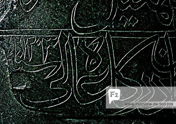 Arabisch in Bronze geschnitzt  Nahaufnahme