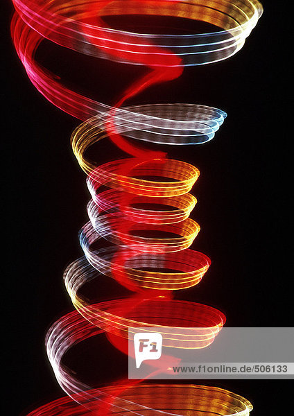 Spiralförmige Lichteffekte  eine in der anderen  rot und gelb.