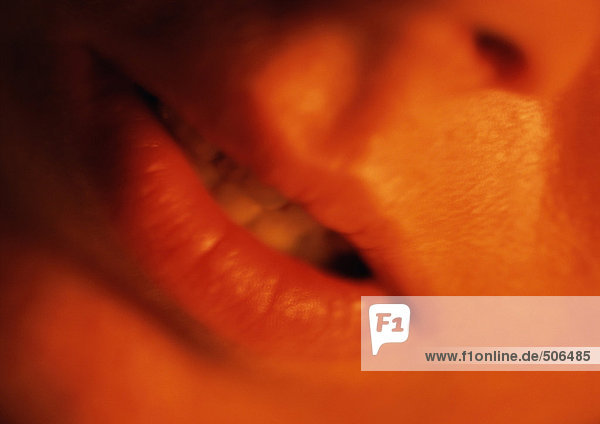 Close up of woman's mouth slightly open. mouth