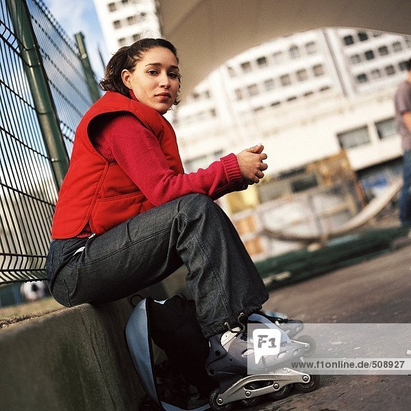 Young woman wearing inline skates  portrait