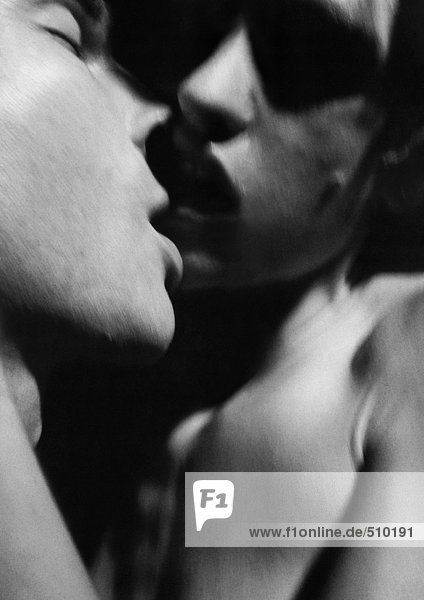 Nude couple kissing  close-up  b&w