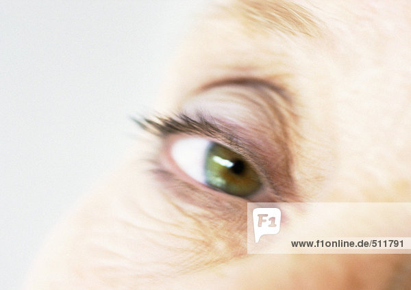 Senior woman's eye  close-up  blurred