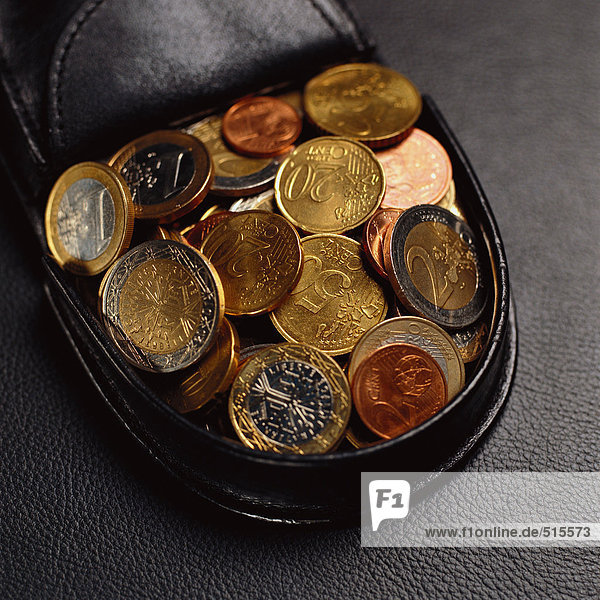 Münzen im Münzbehälter